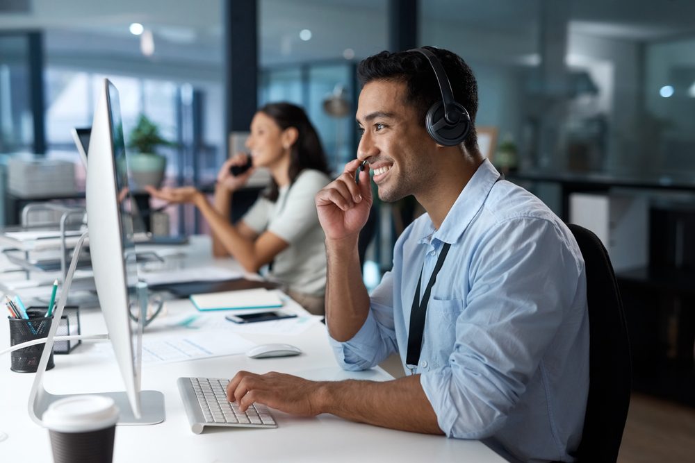 A man is entertaining a client through phone