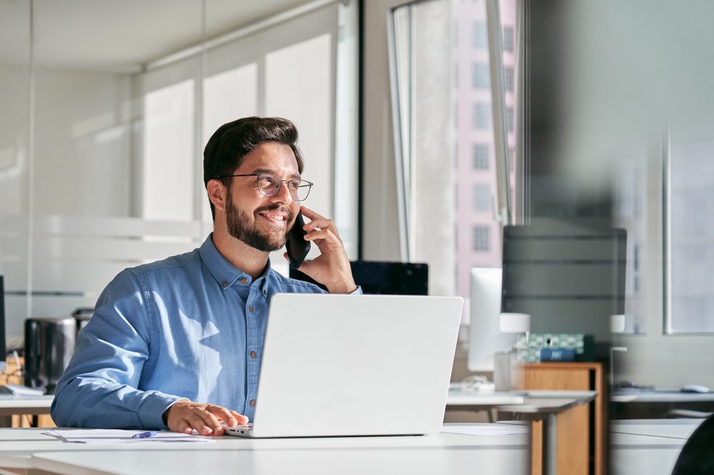 Businessman is having a phone call from someone